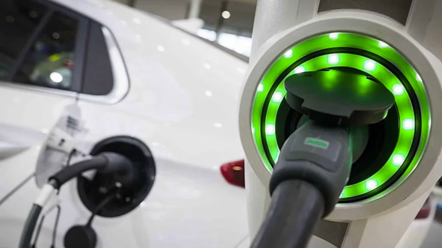Picture of the charge port of an electric car being charged